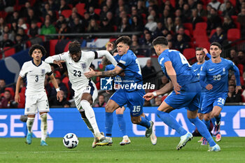 2024-10-10 - Noni Madueke (23) of England and Lazaros Rota (15) of Greece during the UEFA Nations League, League B, Group B2 football match between England and Greece on 10 October 2024 at Wembley Stadium in London, England - FOOTBALL - UEFA NATIONS LEAGUE - ENGLAND V GREECE - UEFA NATIONS LEAGUE - SOCCER