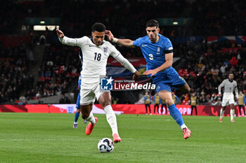 2024-10-10 - Ollie Watkins (18) of England and Konstantinos Koulierakis (3) of Greece during the UEFA Nations League, League B, Group B2 football match between England and Greece on 10 October 2024 at Wembley Stadium in London, England - FOOTBALL - UEFA NATIONS LEAGUE - ENGLAND V GREECE - UEFA NATIONS LEAGUE - SOCCER