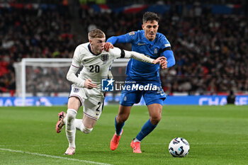 2024-10-10 - Cole Palmer (20) of England and Dimitris Giannoulis (22) of Greece during the UEFA Nations League, League B, Group B2 football match between England and Greece on 10 October 2024 at Wembley Stadium in London, England - FOOTBALL - UEFA NATIONS LEAGUE - ENGLAND V GREECE - UEFA NATIONS LEAGUE - SOCCER