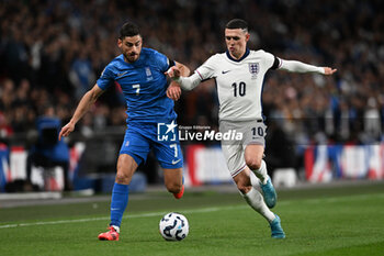 2024-10-10 - George Masouras (7) of Greece and Phil Foden (10) of England during the UEFA Nations League, League B, Group B2 football match between England and Greece on 10 October 2024 at Wembley Stadium in London, England - FOOTBALL - UEFA NATIONS LEAGUE - ENGLAND V GREECE - UEFA NATIONS LEAGUE - SOCCER