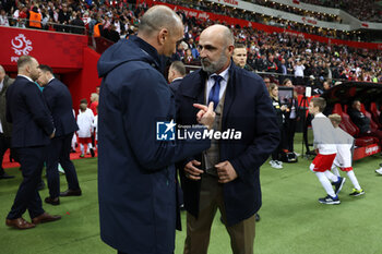 2024-10-12 - Coach Roberto Martinez of Portugal and Coach Michal Probierz of Poland during the UEFA Nations League, League A, Group A1 football match between Poland and Portugal on 12 October 2024 at PGE Narodowy in Warsaw, Poland - FOOTBALL - UEFA NATIONS LEAGUE - POLAND V PORTUGAL - UEFA NATIONS LEAGUE - SOCCER