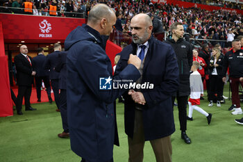 2024-10-12 - Coach Roberto Martinez of Portugal and Coach Michal Probierz of Poland during the UEFA Nations League, League A, Group A1 football match between Poland and Portugal on 12 October 2024 at PGE Narodowy in Warsaw, Poland - FOOTBALL - UEFA NATIONS LEAGUE - POLAND V PORTUGAL - UEFA NATIONS LEAGUE - SOCCER