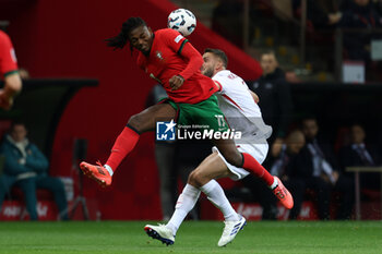 2024-10-12 - Rafael Leao of Portugal and Sebastian Walukiewicz of Poland during the UEFA Nations League, League A, Group A1 football match between Poland and Portugal on 12 October 2024 at PGE Narodowy in Warsaw, Poland - FOOTBALL - UEFA NATIONS LEAGUE - POLAND V PORTUGAL - UEFA NATIONS LEAGUE - SOCCER