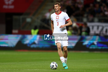 2024-10-12 - Pawel Dawidowicz of Poland during the UEFA Nations League, League A, Group A1 football match between Poland and Portugal on 12 October 2024 at PGE Narodowy in Warsaw, Poland - FOOTBALL - UEFA NATIONS LEAGUE - POLAND V PORTUGAL - UEFA NATIONS LEAGUE - SOCCER