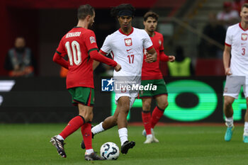 2024-10-12 - Maximillian Oyedele of Poland during the UEFA Nations League, League A, Group A1 football match between Poland and Portugal on 12 October 2024 at PGE Narodowy in Warsaw, Poland - FOOTBALL - UEFA NATIONS LEAGUE - POLAND V PORTUGAL - UEFA NATIONS LEAGUE - SOCCER