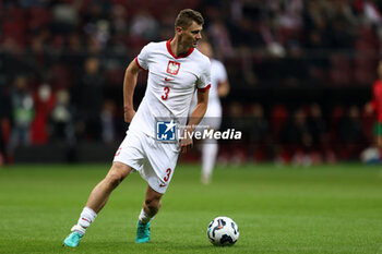 2024-10-12 - Pawel Dawidowicz of Poland during the UEFA Nations League, League A, Group A1 football match between Poland and Portugal on 12 October 2024 at PGE Narodowy in Warsaw, Poland - FOOTBALL - UEFA NATIONS LEAGUE - POLAND V PORTUGAL - UEFA NATIONS LEAGUE - SOCCER