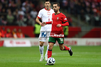 2024-10-12 - Robert Lewandowski of Poland and Bernardo Silva of Portugal during the UEFA Nations League, League A, Group A1 football match between Poland and Portugal on 12 October 2024 at PGE Narodowy in Warsaw, Poland - FOOTBALL - UEFA NATIONS LEAGUE - POLAND V PORTUGAL - UEFA NATIONS LEAGUE - SOCCER