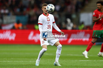 2024-10-12 - Sebastian Szymanski of Poland during the UEFA Nations League, League A, Group A1 football match between Poland and Portugal on 12 October 2024 at PGE Narodowy in Warsaw, Poland - FOOTBALL - UEFA NATIONS LEAGUE - POLAND V PORTUGAL - UEFA NATIONS LEAGUE - SOCCER