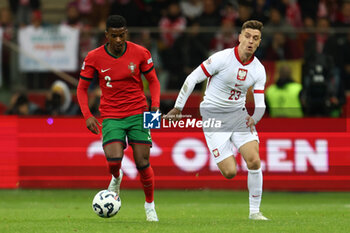 2024-10-12 - Nelson Semedo of Portugal and Krzysztof Piatek of Poland during the UEFA Nations League, League A, Group A1 football match between Poland and Portugal on 12 October 2024 at PGE Narodowy in Warsaw, Poland - FOOTBALL - UEFA NATIONS LEAGUE - POLAND V PORTUGAL - UEFA NATIONS LEAGUE - SOCCER