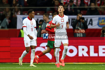 2024-10-12 - Michael Ameyaw, Kacper Urbanski of Poland during the UEFA Nations League, League A, Group A1 football match between Poland and Portugal on 12 October 2024 at PGE Narodowy in Warsaw, Poland - FOOTBALL - UEFA NATIONS LEAGUE - POLAND V PORTUGAL - UEFA NATIONS LEAGUE - SOCCER