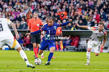 2024-10-14 - Xavi Simons of Netherlands during the UEFA Nations League, League A, Group 3 football match between Germany and Netherlands on October 14, 2024 at Allianz Arena in Munich, Germany - FOOTBALL - UEFA NATIONS LEAGUE - GERMANY V NETHERLANDS - UEFA NATIONS LEAGUE - SOCCER