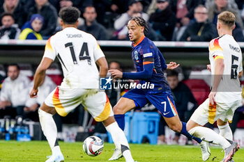 2024-10-14 - Xavi Simons of Netherlands during the UEFA Nations League, League A, Group 3 football match between Germany and Netherlands on October 14, 2024 at Allianz Arena in Munich, Germany - FOOTBALL - UEFA NATIONS LEAGUE - GERMANY V NETHERLANDS - UEFA NATIONS LEAGUE - SOCCER