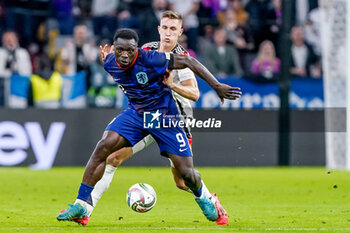 2024-10-14 - Brian Brobbey of Netherlands battles for the ball with Nico Schlotterbeck of Germany during the UEFA Nations League, League A, Group 3 football match between Germany and Netherlands on October 14, 2024 at Allianz Arena in Munich, Germany - FOOTBALL - UEFA NATIONS LEAGUE - GERMANY V NETHERLANDS - UEFA NATIONS LEAGUE - SOCCER