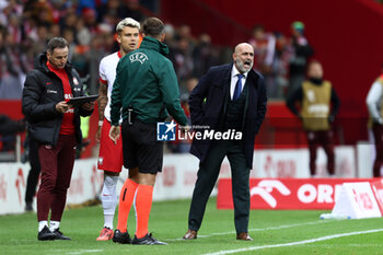 2024-10-15 - Kamil Piatkowski and Coach Michal Probierz of Poland during the UEFA Nations League, League A, Group A1 football match between Poland and Croatia on 15 October 2024 at PGE Narodowy stadium in Warsaw, Poland - FOOTBALL - UEFA NATIONS LEAGUE - POLAND V CROATIA - UEFA NATIONS LEAGUE - SOCCER