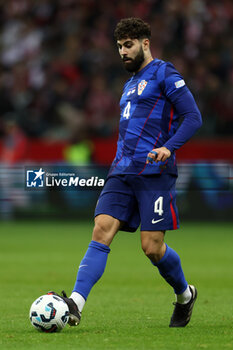 2024-10-15 - Josko Gvardiol of Croatia during the UEFA Nations League, League A, Group A1 football match between Poland and Croatia on 15 October 2024 at PGE Narodowy stadium in Warsaw, Poland - FOOTBALL - UEFA NATIONS LEAGUE - POLAND V CROATIA - UEFA NATIONS LEAGUE - SOCCER