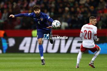 2024-10-15 - Josko Gvardiol of Croatia during the UEFA Nations League, League A, Group A1 football match between Poland and Croatia on 15 October 2024 at PGE Narodowy stadium in Warsaw, Poland - FOOTBALL - UEFA NATIONS LEAGUE - POLAND V CROATIA - UEFA NATIONS LEAGUE - SOCCER