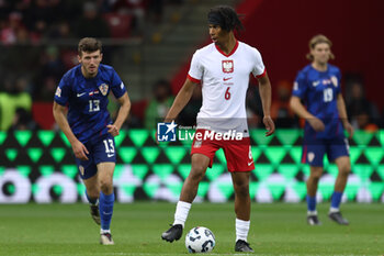 2024-10-15 - Maximillian Oyedele of Poland during the UEFA Nations League, League A, Group A1 football match between Poland and Croatia on 15 October 2024 at PGE Narodowy stadium in Warsaw, Poland - FOOTBALL - UEFA NATIONS LEAGUE - POLAND V CROATIA - UEFA NATIONS LEAGUE - SOCCER