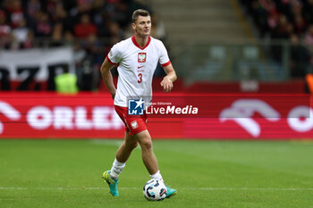 2024-10-15 - Pawel Dawidowicz of Poland during the UEFA Nations League, League A, Group A1 football match between Poland and Croatia on 15 October 2024 at PGE Narodowy stadium in Warsaw, Poland - FOOTBALL - UEFA NATIONS LEAGUE - POLAND V CROATIA - UEFA NATIONS LEAGUE - SOCCER