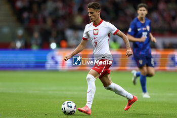 2024-10-15 - Kacper Urbanski of Poland during the UEFA Nations League, League A, Group A1 football match between Poland and Croatia on 15 October 2024 at PGE Narodowy stadium in Warsaw, Poland - FOOTBALL - UEFA NATIONS LEAGUE - POLAND V CROATIA - UEFA NATIONS LEAGUE - SOCCER