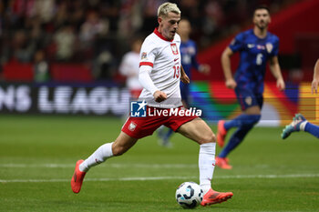 2024-10-15 - Jakub Kaminski of Poland during the UEFA Nations League, League A, Group A1 football match between Poland and Croatia on 15 October 2024 at PGE Narodowy stadium in Warsaw, Poland - FOOTBALL - UEFA NATIONS LEAGUE - POLAND V CROATIA - UEFA NATIONS LEAGUE - SOCCER