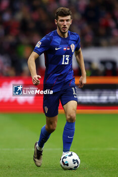 2024-10-15 - Petar Sucic of Croatia during the UEFA Nations League, League A, Group A1 football match between Poland and Croatia on 15 October 2024 at PGE Narodowy stadium in Warsaw, Poland - FOOTBALL - UEFA NATIONS LEAGUE - POLAND V CROATIA - UEFA NATIONS LEAGUE - SOCCER