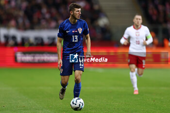 2024-10-15 - Petar Sucic of Croatia during the UEFA Nations League, League A, Group A1 football match between Poland and Croatia on 15 October 2024 at PGE Narodowy stadium in Warsaw, Poland - FOOTBALL - UEFA NATIONS LEAGUE - POLAND V CROATIA - UEFA NATIONS LEAGUE - SOCCER