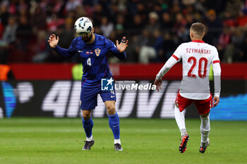 2024-10-15 - Josko Gvardiol of Croatia during the UEFA Nations League, League A, Group A1 football match between Poland and Croatia on 15 October 2024 at PGE Narodowy stadium in Warsaw, Poland - FOOTBALL - UEFA NATIONS LEAGUE - POLAND V CROATIA - UEFA NATIONS LEAGUE - SOCCER