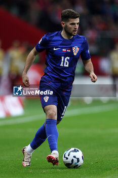 2024-10-15 - Martin Baturina of Croatia during the UEFA Nations League, League A, Group A1 football match between Poland and Croatia on 15 October 2024 at PGE Narodowy stadium in Warsaw, Poland - FOOTBALL - UEFA NATIONS LEAGUE - POLAND V CROATIA - UEFA NATIONS LEAGUE - SOCCER