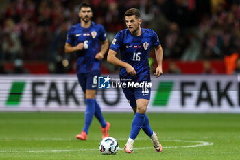 2024-10-15 - Martin Baturina of Croatia during the UEFA Nations League, League A, Group A1 football match between Poland and Croatia on 15 October 2024 at PGE Narodowy stadium in Warsaw, Poland - FOOTBALL - UEFA NATIONS LEAGUE - POLAND V CROATIA - UEFA NATIONS LEAGUE - SOCCER