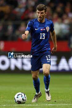 2024-10-15 - Petar Sucic of Croatia during the UEFA Nations League, League A, Group A1 football match between Poland and Croatia on 15 October 2024 at PGE Narodowy stadium in Warsaw, Poland - FOOTBALL - UEFA NATIONS LEAGUE - POLAND V CROATIA - UEFA NATIONS LEAGUE - SOCCER