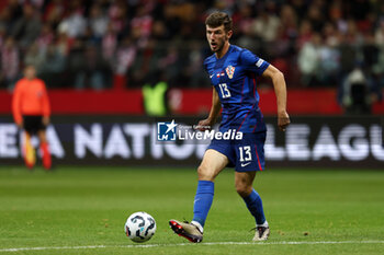 2024-10-15 - Petar Sucic of Croatia during the UEFA Nations League, League A, Group A1 football match between Poland and Croatia on 15 October 2024 at PGE Narodowy stadium in Warsaw, Poland - FOOTBALL - UEFA NATIONS LEAGUE - POLAND V CROATIA - UEFA NATIONS LEAGUE - SOCCER