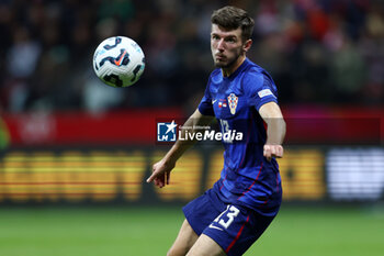 2024-10-15 - Petar Sucic of Croatia during the UEFA Nations League, League A, Group A1 football match between Poland and Croatia on 15 October 2024 at PGE Narodowy stadium in Warsaw, Poland - FOOTBALL - UEFA NATIONS LEAGUE - POLAND V CROATIA - UEFA NATIONS LEAGUE - SOCCER