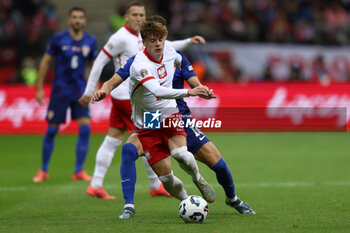 2024-10-15 - Nicola Zalewski of Poland during the UEFA Nations League, League A, Group A1 football match between Poland and Croatia on 15 October 2024 at PGE Narodowy stadium in Warsaw, Poland - FOOTBALL - UEFA NATIONS LEAGUE - POLAND V CROATIA - UEFA NATIONS LEAGUE - SOCCER