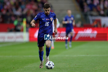 2024-10-15 - Martin Baturina of Croatia during the UEFA Nations League, League A, Group A1 football match between Poland and Croatia on 15 October 2024 at PGE Narodowy stadium in Warsaw, Poland - FOOTBALL - UEFA NATIONS LEAGUE - POLAND V CROATIA - UEFA NATIONS LEAGUE - SOCCER