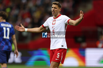 2024-10-15 - Jan Bednarek of Poland during the UEFA Nations League, League A, Group A1 football match between Poland and Croatia on 15 October 2024 at PGE Narodowy stadium in Warsaw, Poland - FOOTBALL - UEFA NATIONS LEAGUE - POLAND V CROATIA - UEFA NATIONS LEAGUE - SOCCER