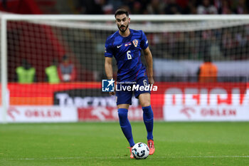 2024-10-15 - Josip Sutalo of Croatia during the UEFA Nations League, League A, Group A1 football match between Poland and Croatia on 15 October 2024 at PGE Narodowy stadium in Warsaw, Poland - FOOTBALL - UEFA NATIONS LEAGUE - POLAND V CROATIA - UEFA NATIONS LEAGUE - SOCCER