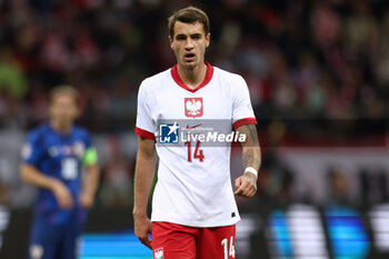 2024-10-15 - Jakub Kiwior of Poland during the UEFA Nations League, League A, Group A1 football match between Poland and Croatia on 15 October 2024 at PGE Narodowy stadium in Warsaw, Poland - FOOTBALL - UEFA NATIONS LEAGUE - POLAND V CROATIA - UEFA NATIONS LEAGUE - SOCCER