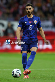 2024-10-15 - Josip Sutalo of Croatia during the UEFA Nations League, League A, Group A1 football match between Poland and Croatia on 15 October 2024 at PGE Narodowy stadium in Warsaw, Poland - FOOTBALL - UEFA NATIONS LEAGUE - POLAND V CROATIA - UEFA NATIONS LEAGUE - SOCCER