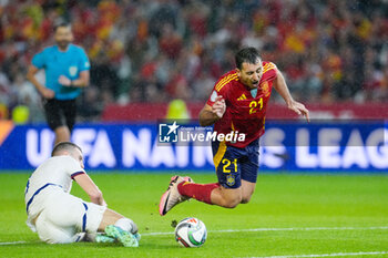 2024-10-15 - Mikel Oyarzabal of Spain and Strahinja Pavlovic of Serbia during the UEFA Nations League, League A, Group A4 football match between Spain and Serbia on October 15, 2024 at Nuevo Arcangel stadium in Cordoba, Spain - FOOTBALL - UEFA NATIONS LEAGUE - SPAIN V SERBIA - UEFA NATIONS LEAGUE - SOCCER