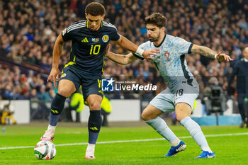 15/10/2024 - Ché Adams Scotland and Rúben Neves of Portugal during the UEFA Nations League, League A, Group A1 football match between Scotland and Portugal on 15 October 2024 at Hampden Park in Glasgow, Scotland - FOOTBALL - UEFA NATIONS LEAGUE - SCOTLAND V PORTUGAL - UEFA NATIONS LEAGUE - CALCIO