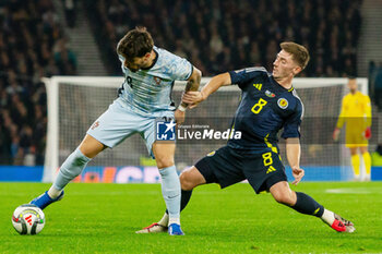 15/10/2024 - Rúben Neves of Portugal and Billy Gilmour of Scotland during the UEFA Nations League, League A, Group A1 football match between Scotland and Portugal on 15 October 2024 at Hampden Park in Glasgow, Scotland - FOOTBALL - UEFA NATIONS LEAGUE - SCOTLAND V PORTUGAL - UEFA NATIONS LEAGUE - CALCIO