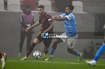 2024-11-17 - Zeno Debast (Belgium) in action against Dor Peretz (Israel) during the UEFA Nations League match between Israel vs. Belgium on 17th November 2024 at the Bozsik Arena stadium in Budapest, Hungary - ISRAEL VS BELGIUM - UEFA NATIONS LEAGUE - SOCCER