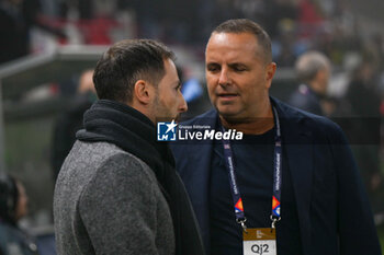 2024-11-17 - Header of coach Domenico Tedesco (Belguim) and Head coach Ran Ben Simon (Israel) during the UEFA Nations League match between Israel vs. Belgium on 17th November 2024 at the Bozsik Arena stadium in Budapest, Hungary - ISRAEL VS BELGIUM - UEFA NATIONS LEAGUE - SOCCER