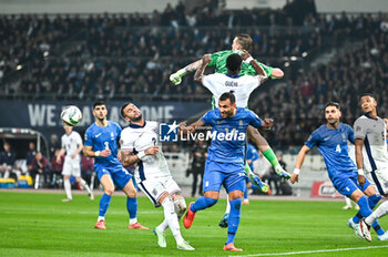 14/11/2024 - 1 Jordan Pickford with 6 Marc Guehi of England compete with 14 Vangelis Pavlidis of Greece during the UEFA Nations League 2024/25 League B, Group B2 match between Greece and England on November 14, 2024 at OAKA Stadium, in Athens, Greece. - GREECE VS ENGLAND - UEFA NATIONS LEAGUE - CALCIO