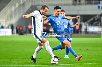 14/11/2024 - 9 Harry Kane of England competes with 22 Dimitris Giannoulis of Greece during the UEFA Nations League 2024/25 League B, Group B2 match between Greece and England on November 14, 2024 at OAKA Stadium, in Athens, Greece. - GREECE VS ENGLAND - UEFA NATIONS LEAGUE - CALCIO