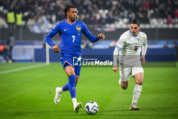 14/11/2024 - Michael OLISE of France and Oscar GLOUKH of Israel during the UEFA Nations League, League A, Group A2 football match between France and Israel on 14 November 2024 at Stade de France in Saint-Denis near Paris, France - FOOTBALL - UEFA NATIONS LEAGUE - FRANCE V ISRAEL - UEFA NATIONS LEAGUE - CALCIO