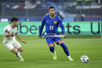 14/11/2024 - Theo Hernandez of France, left Manor Solomon of Israel during the UEFA Nations League, League A, Group A2 football match between France and Israel on 14 November 2024 at Stade de France in Saint-Denis near Paris, France - FOOTBALL - UEFA NATIONS LEAGUE - FRANCE V ISRAEL - UEFA NATIONS LEAGUE - CALCIO