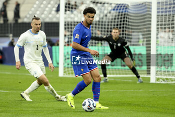 14/11/2024 - Warren Zaire-Emery of France, left Shon Goldberg of Israel during the UEFA Nations League, League A, Group A2 football match between France and Israel on 14 November 2024 at Stade de France in Saint-Denis near Paris, France - FOOTBALL - UEFA NATIONS LEAGUE - FRANCE V ISRAEL - UEFA NATIONS LEAGUE - CALCIO