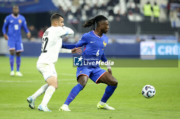 14/11/2024 - Eduardo Camavinga of France, left Mahmoud Jaber of Israel during the UEFA Nations League, League A, Group A2 football match between France and Israel on 14 November 2024 at Stade de France in Saint-Denis near Paris, France - FOOTBALL - UEFA NATIONS LEAGUE - FRANCE V ISRAEL - UEFA NATIONS LEAGUE - CALCIO