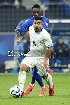 14/11/2024 - Mohammad Abu Fani of Israel, Randal Kolo Muani of France during the UEFA Nations League, League A, Group A2 football match between France and Israel on 14 November 2024 at Stade de France in Saint-Denis near Paris, France - FOOTBALL - UEFA NATIONS LEAGUE - FRANCE V ISRAEL - UEFA NATIONS LEAGUE - CALCIO